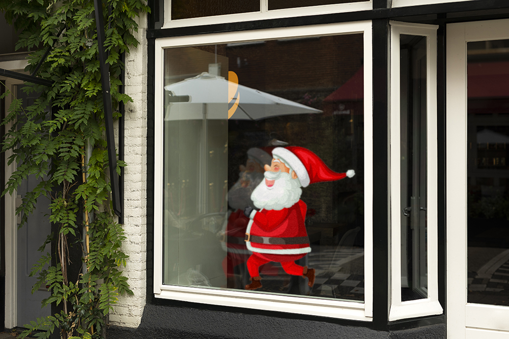 rennen de kerstman (raam)sticker ()