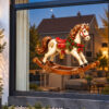 Kerst Raamsticker | Vintage hobbelpaard met kerstkrans en kerstsieraden preview